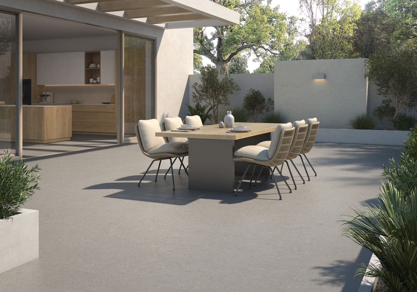 Silver-toned outdoor porcelain paving on an alfresco terrace